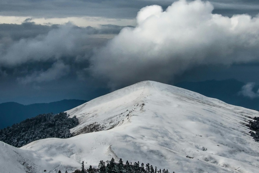 Snow covered mountain top.